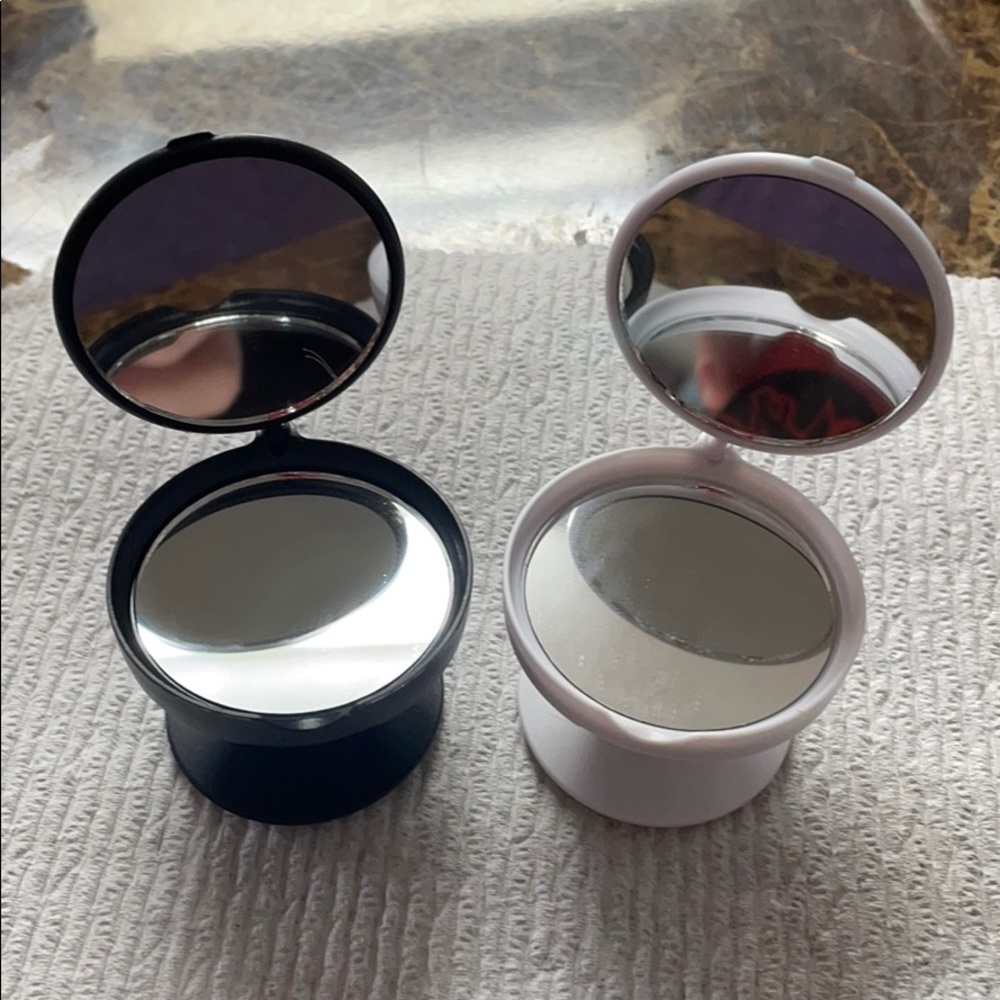 Mirror phone grippers